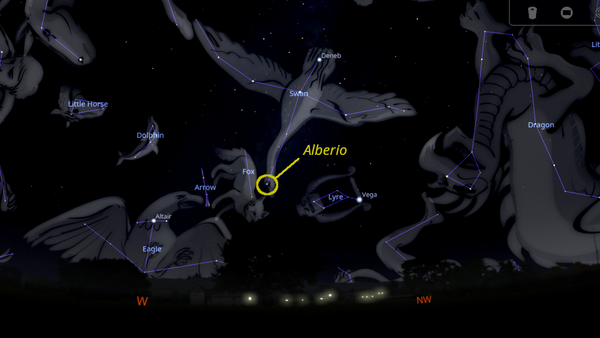 A star map of the Western sky shows constellation Cygnus, the Swan, with the star Albireo circled at the head of the Swan.